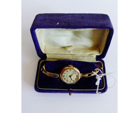 Lady's 9 carat gold cased wristwatch, the octagonal enamel dial with Arabic numerals and retailer's mark for J. Ritchie and S