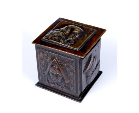 A 1930'S BRONZED METAL TEA CADDY, of cube form, relief decorated with Alice, the Duchess, the Mad Hatter, Queen, and Knave of