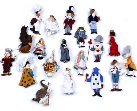 A LARGE COLLECTION OF ALICE IN WONDERLAND CHRISTMAS TREE DECORATIONS TO INCLUDE: a Kurt Adler glass Alice bauble, and similar
