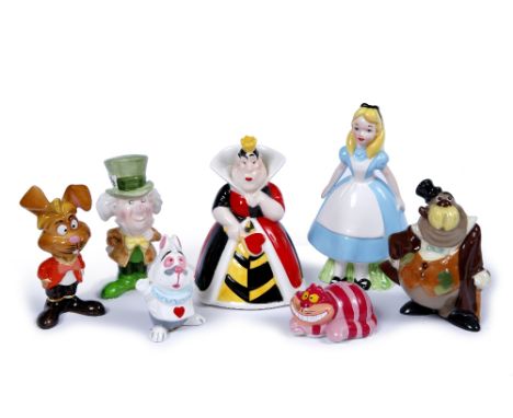 A SET OF SIX DISNEY CERAMIC ALICE IN WONDERLAND FIGURES COMPRISING: Alice, the Mad Hatter, Queen of Hearts, Rabbit, Walrus an