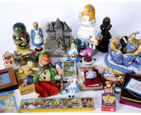 A QUANTITY OF ASSORTED ALICE IN WONDERLAND COLLECTIBLES TO INCLUDE: a Russian doll, small plastic figures, a set of finger pu