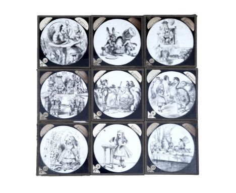 A RARE SET OF FORTY TWO BLACK AND WHITE ALICE IN WONDERLAND MAGIC LANTERN SLIDES