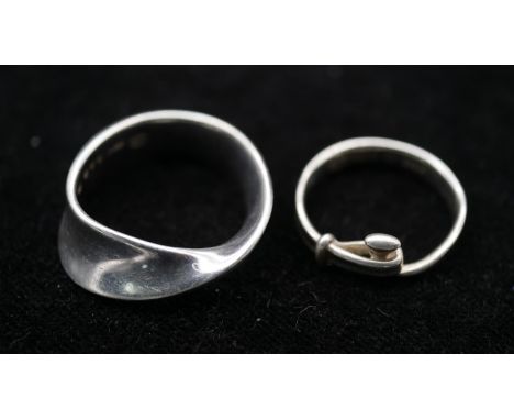 Two Danish silver rings, one designed by Vivannia Torun Bulow-Hube FOR Georg Jensen, a MÖBIUS ring number 148B, designed as a