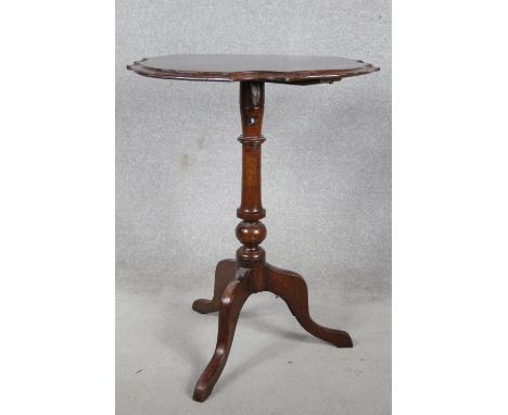 A late 19th century occasional table, the moulded shaped top with paterae central inlay on tripod cabriole pedestal base. H.7