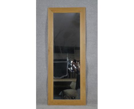 A dressing mirror in light oak frame. H.136.5 W.52.5cm 