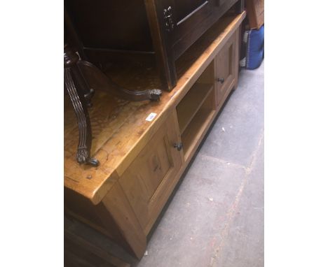 A modern light oak av stand 