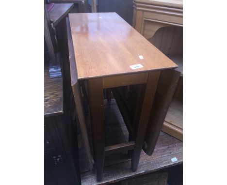 A teak drop leaf table and a pine corner shelf 