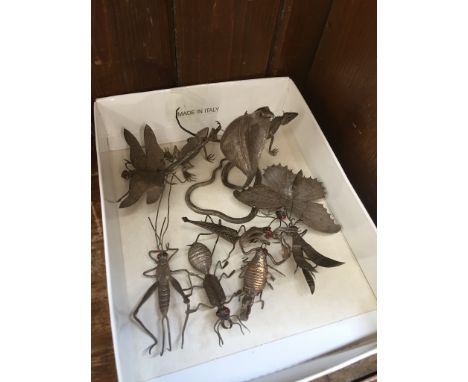 Small silver menu card holders in the form of insects etc.Condition:- General wear through age and use, no sign of any damage