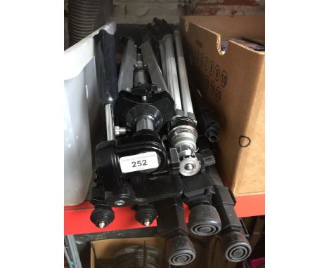 Five camera tripods 