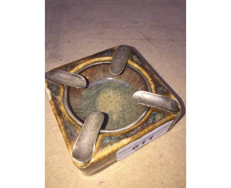 A Doulton Lambeth hallmarked silver mounted ash tray. 