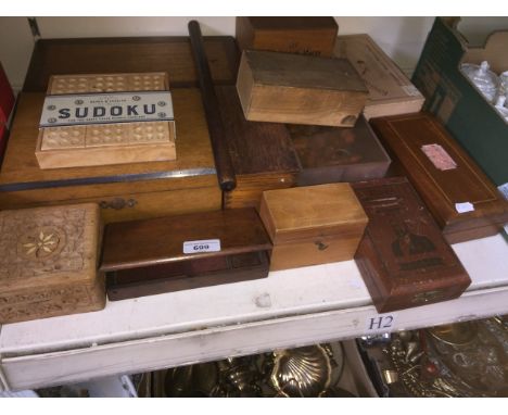 A quantity of wooden boxes including a hydrometer, old cigar boxes (empty), two complete chess sets, etc.