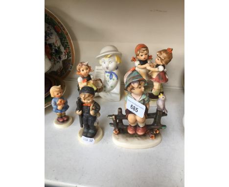 A collection of 7 vintage Hummel figurines 
