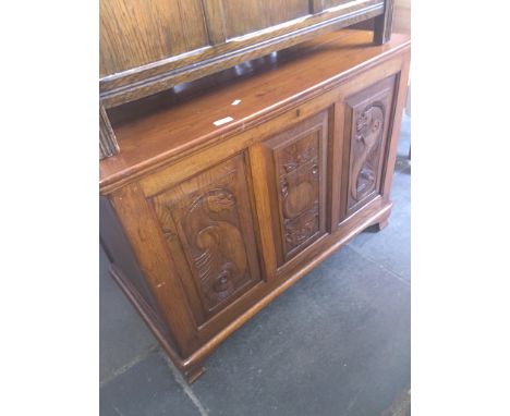 An oak bedding trunk with carved panels to frontCondition: splits to top/lid, hinges ok, other minor general age related surf