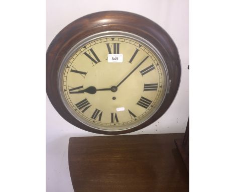 An early 20th century wall clock with painted steel dial, comes with pendulum.Condition: surface wear to outer rim of case, n