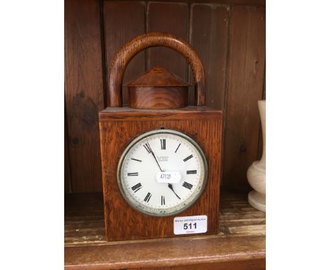 Lantern style oak clock with white enamel dial signed H. greaves New Street Birmingham 