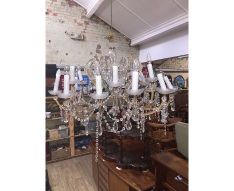 A crystal and gilt metal chandelier, 20th century, diam. approx. 100cm. 