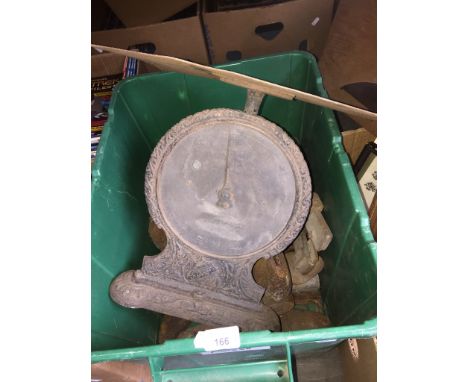 A box of misc metalware to include cast iron cobbler shoe forms / moulds and vintage metal weighing scale. 