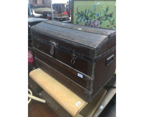 An antique domed and bound trunk 