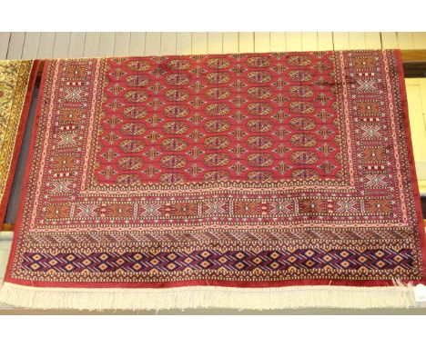 Red ground Bokhara carpet 2.30 by 1.60