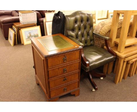 Green leather button back desk chair and two drawer mahogany finish filing cabinet