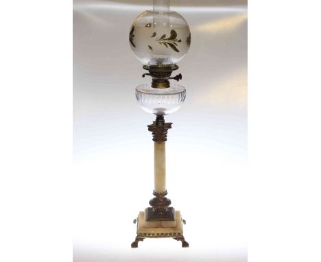 Gilt metal and alabaster oil lamp with shade