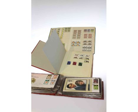 Two albums of stamps and album of first day covers