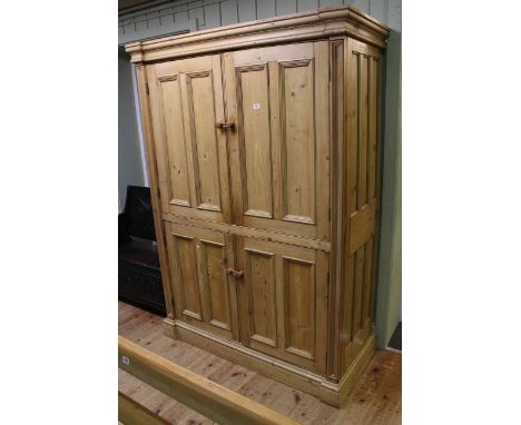 Pine larder cupboard, with two pairs of two-panel doors, 137.5cm wide