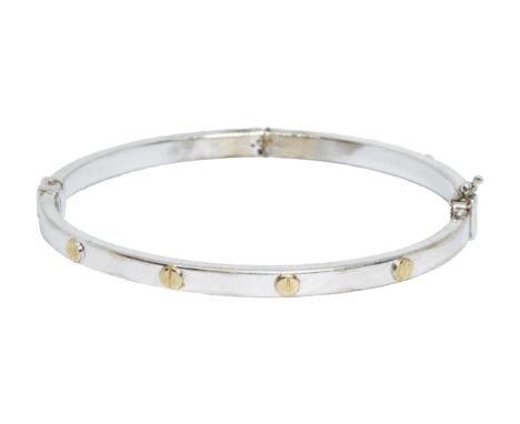 A 9ct white gold Cartier style bangle, diameter approximately 58mm, gross weight 6.6g.  Condition - damaged/repaired see imag
