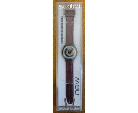 SWATCH AUTOMATIC: a "Rubin" Swatch automatic wristwatch, ref. SAM100V, circa 1991, with box and papers.  Condition - appears 