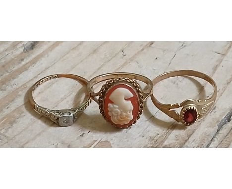 Two hallmarked 9ct gold rings and another marked '9ct', gross weight 6.3g, size P, R &amp; V.