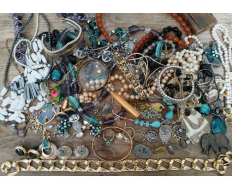 A collection of costume jewellery including Boucher, gold plated items, a gold plated bangle etc.Note:- boucher brooch clip i