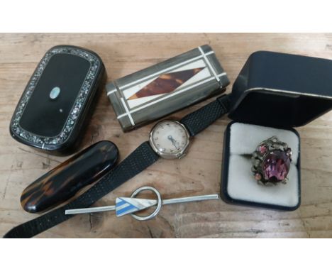 A mixed lot of collectables including silver wristwatch, trinket boxes, Eastern napkin rings, ring, bar brooch, etc.