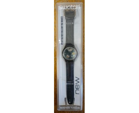 SWATCH AUTOMATIC: a "Black Motion" Swatch automatic wristwatch, ref. SAB100, circa 1991, with box and papers.  Condition - ap