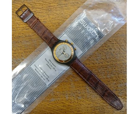 SWATCH CHRONO: "Goldfinger" Swatch chronograph wristwatch, ref. SCM100, circa 1991, with brown leather strap and original bag