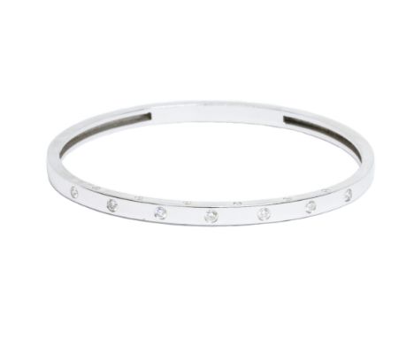 A diamond bangle, square section set with nineteen round brilliant cut stones weighing approximately 0.60cts, white metal mar