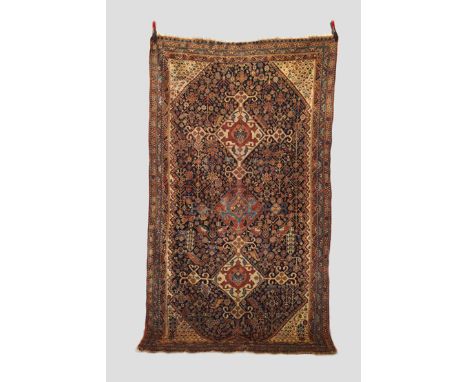  Rug by  the Arab-cherpanlu tireh of the Qashqa'i Confederation, Fars, second half 19th century, 9ft. 2in. x 5ft. 2in. 2.80m.