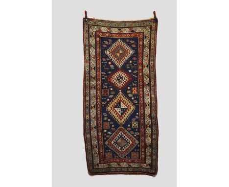 Shulaver Kazak long rug, south west Caucasus, late 19th/early 20th century, 8ft. 1in. X 3ft. 11in. 2.46m. X 1.20m. Slight wea