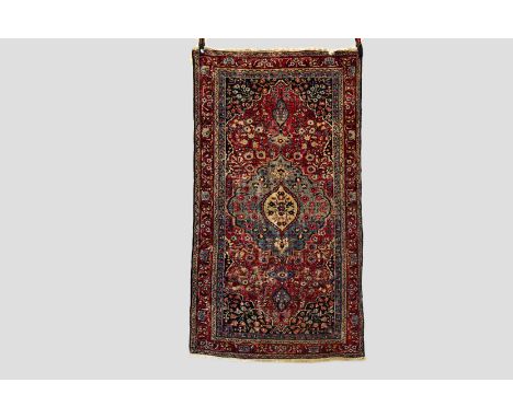 Doroksh rug, Khorasan region, north east Persia, early 20th century, 6ft. 1in. X 3ft. 5in. 1.86m. X 1.04m. Overall wear with 