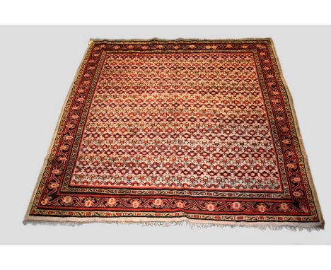 Masulipatam carpet, east India, circa 1930s-40s, 7ft. 9in. X 7ft. 5in. 2.36m. X 2.26m. Some wear and corrosion to dark brown 