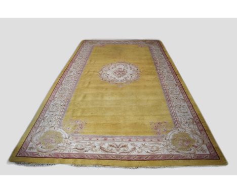 Indian carpet, mid-20th century, 232ft. X 12ft.  3in. 7.01m. X 3.73m.  Some surface marks, especially at the top end..  Pale 
