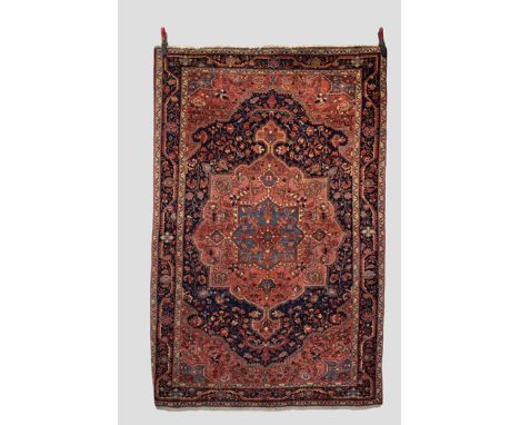 Jozan rug, west Persia, circa 1930s-40s, 6ft. 11in. X 4ft. 6in. 2.11m. X 1.37m. Dark blue field with light red and pale blue 