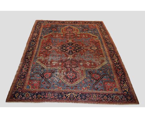 Heriz carpet, north west Persia, late 19th/early 20th century, 13ft. 9in. X 11ft. 5in. 4.19m. X 3.48m. Overall wear, slightly