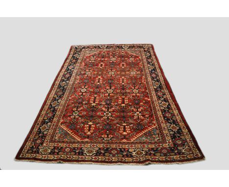 Mahal carpet, north west Persia, circa 1920s 10ft. 8in. X 7ft. 6in. (lower end) to 6ft. 7in at top end.  3.25m. X 2.29m. To 2