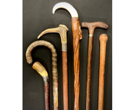 An antler handled silver metal mounted walking stick, others horn, carved, etc (6) 