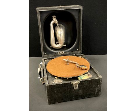 A Vintage Decca portable gramophone, with winding handle and ‘songster’ tin of needles. 