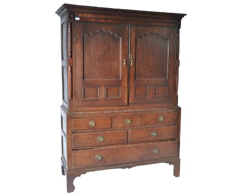 A large 19th Century Dutch antique oak livery housekeepers cupboard having a twin door cupboard with fitted shelf interior.&n