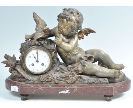 Japy Freres - A 19th Century antique French bronze mantel clock having a large figural winged cherub putti resting on clock p