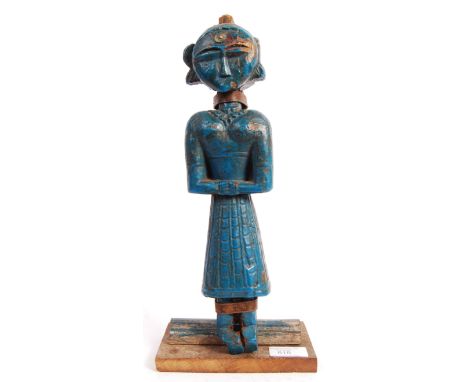 A stunning 19th Century folk art&nbsp;wooden carved figure depicting a women with crossed arms and wearing a necklace, top an