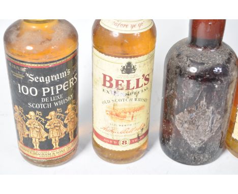 A great collection of 6x bottles of vintage whisky comprising Seagrams 100 Pipers, The Claymore Scotch Whisky, Bells Extra Sp