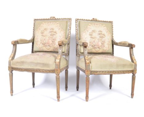 A late 19th Century French antique salon suite comprising of a gilt wood sofa settee with a pair of matching armchairs. Each 